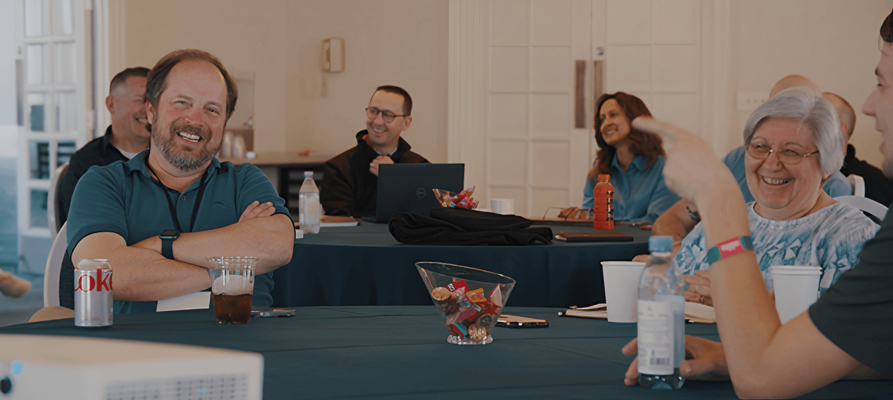 Volaris Group Leader, Trey Drake, Tribute President, Susie Hopper, and other software leaders sharing some laughs at the 2023 VBU Leader Summit.